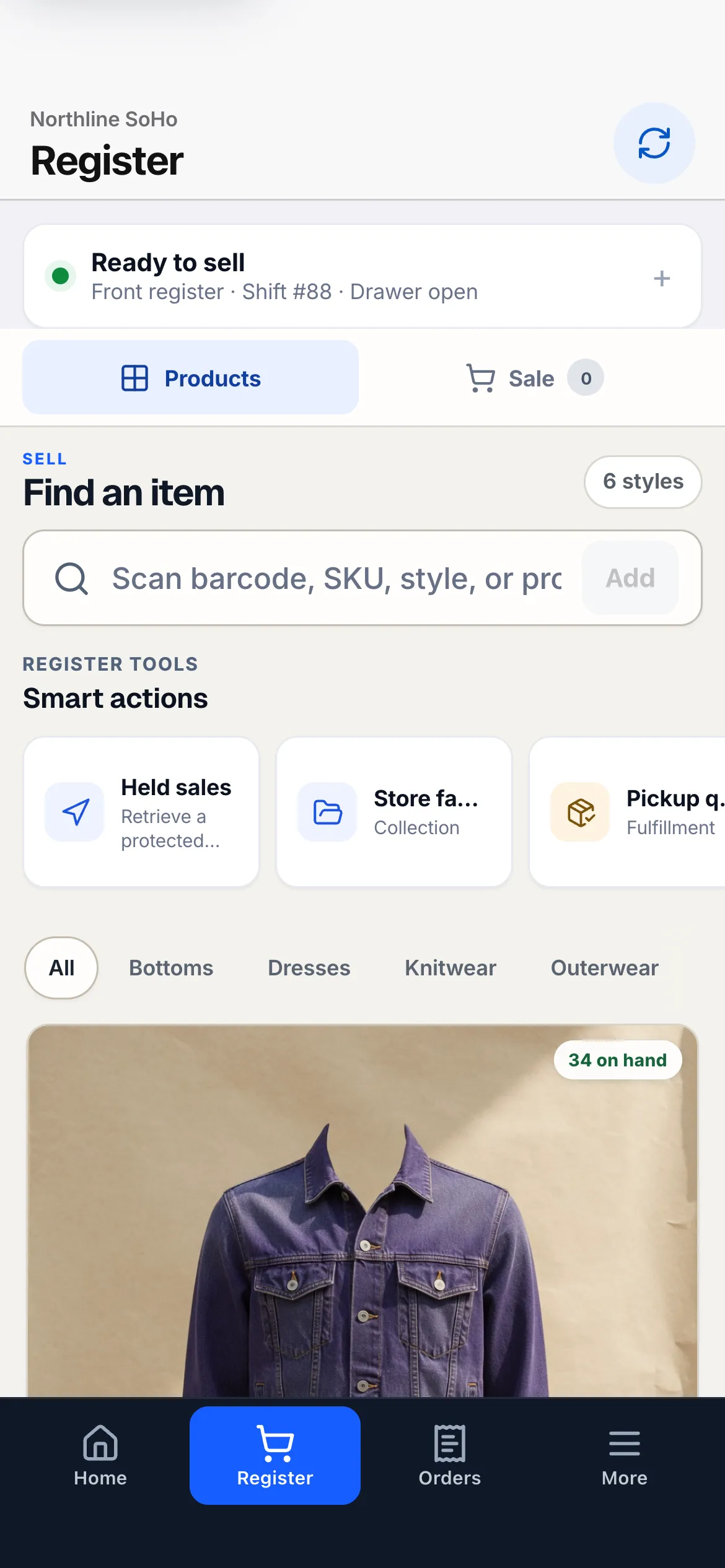 TelaIQ Register on iPhone with a product grid and cart